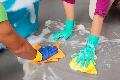 Carpet cleaning staff preparing equipment safely
