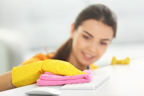 Worker using carpet cleaning machine with caution